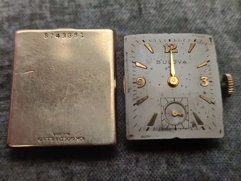Dial face and outer caseback with serial number