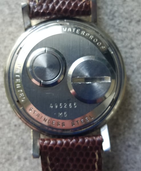 Rear of watch, please see serial number/model number. 