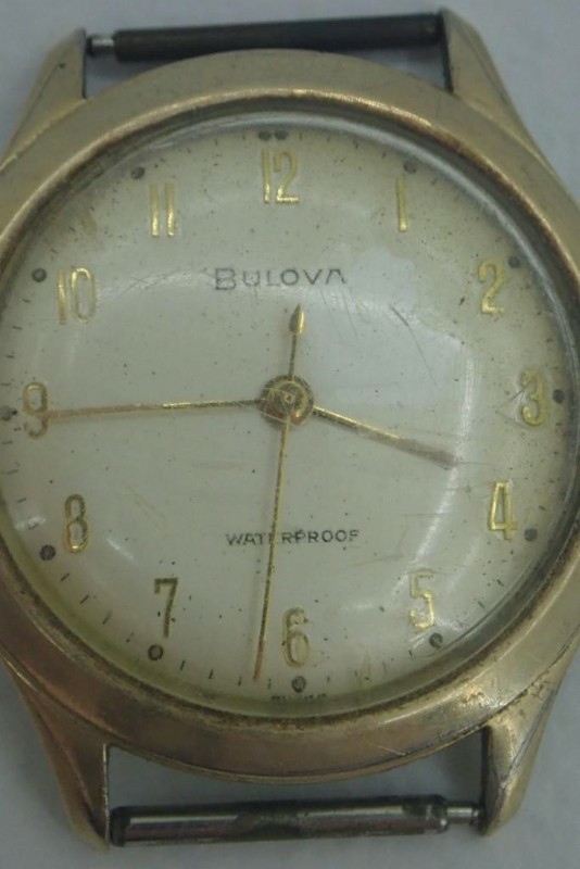 Watch before cleaning and new crystal 