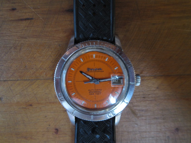 1965 Bulova Oceanographer Snorkel diver. Steel case, orange dial, signed crown.