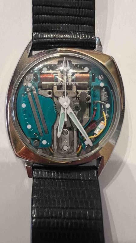 Front face of watch showing dial and case