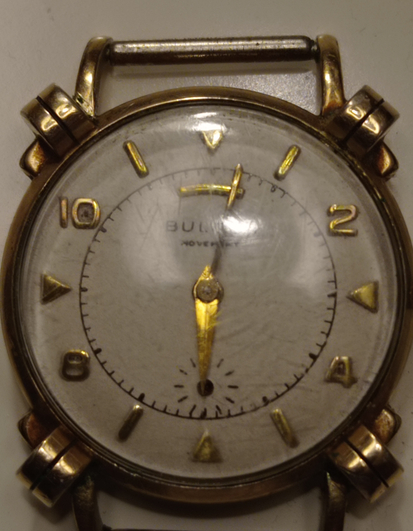 Front of the watch. Unusual with the numbers 2,4,8 and 10.