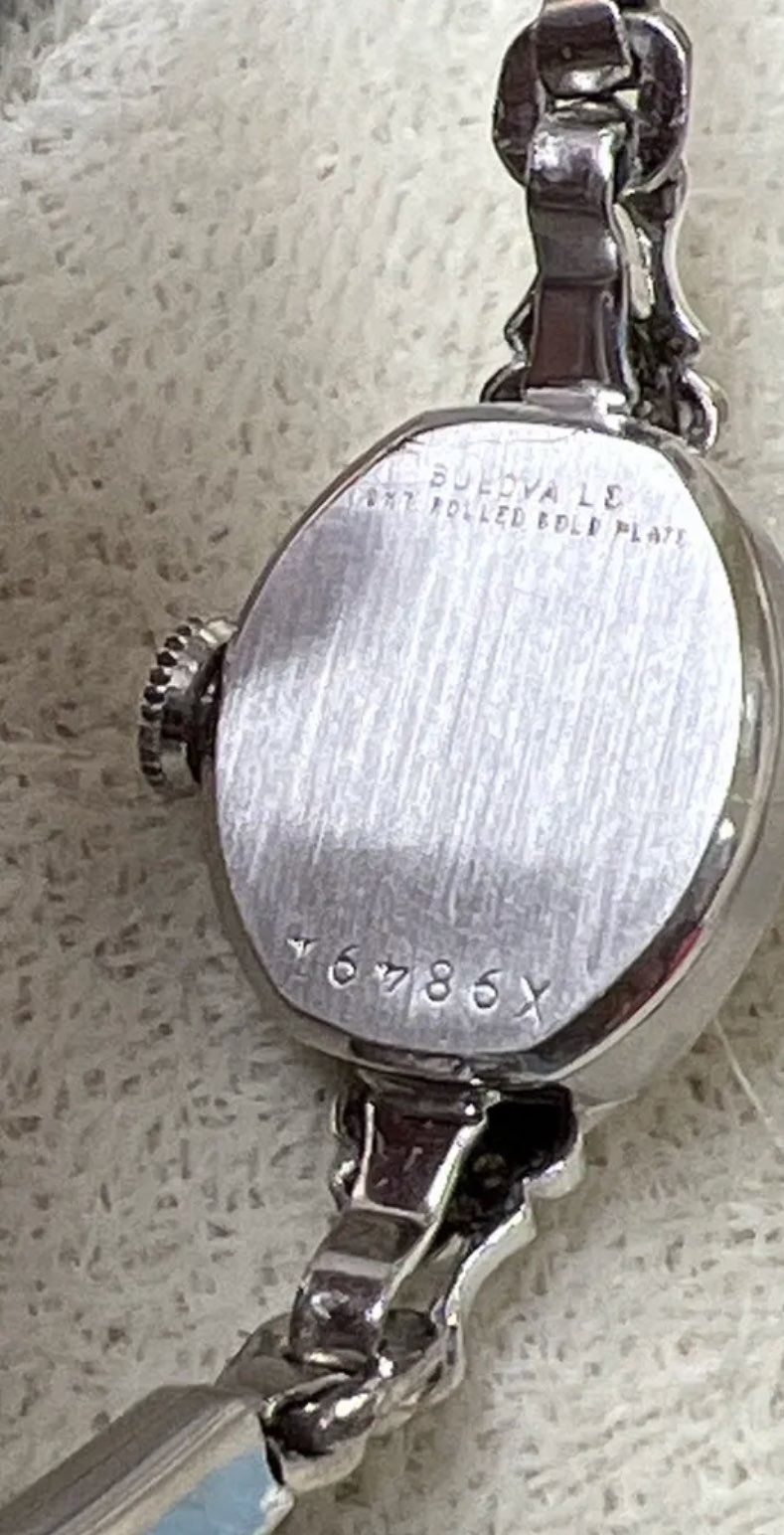 Back of watch with engravings and case  number