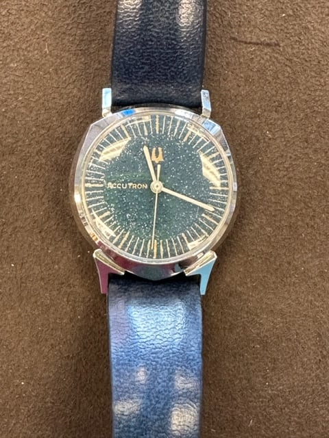 Blue dial with white speckles